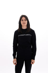 A photo showing ‘The Defiant Co’ long sleeved unisex t-shirt. The shirt has the famous ‘The Defiant Co’ logo across the front of the chest.  The shirt has a round neck and is slightly oversized. The shirt colour is black.