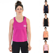 Load image into Gallery viewer, A photo collage showing the front design of the five variations of The Defiant Never Die tank top.  The colour options are black, navy, orchid flower, volcanic stone and pink.  The tanks are a standard fit.  The back design has the bold skull and lightening design with The Defiant Never Die slogan across the top and The Defiant Co along the bottom along with the date Defiant was formed.  The front has the DFNT. Logo to the left breast.