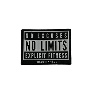 A photo of a velcro patch designed to stick to your gym bag.  The finish is rubber. the main colour is black and the text is white.  The patch states NO EXCUSES, NO LIMITS, EXPLICIT FITNESS.