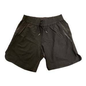 A photo of the best selling The Defiant Co Performance Shorts.  The shorts have a black elasticated waistband with draw strings and have The Defiant Co logo down the left leg.  The shorts have two pockets, one either side and are the colour black.