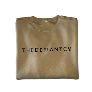 A high-quality Crewneck Sweatshirt for use in the gym and beyond! Crewnecks are absolutely indispensable basics – and this Sweatshirt is a firm favourite for its soft wearing comfort. The crewneck is a standard unisex fit and has the Famous The Defiant Co logo embossed across the chest. The colour is beige.
